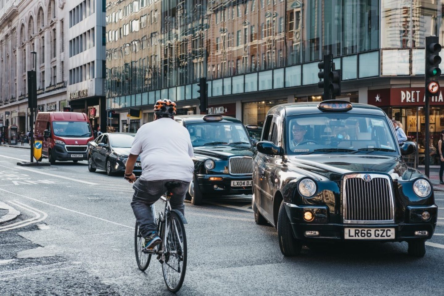 Shutterstock 1169569993 cyclist and black cab editorial use only 1000x667px