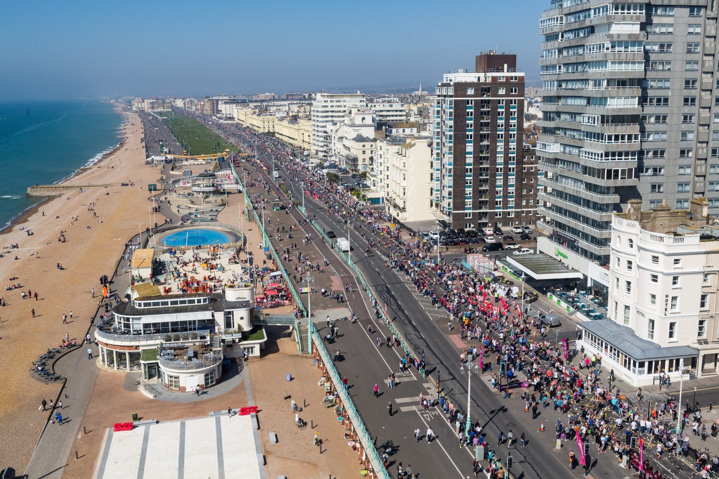 An aerial view of a running event taking place next to the Brighton Seafront.