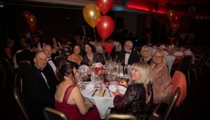 Award ceremony group of people at table