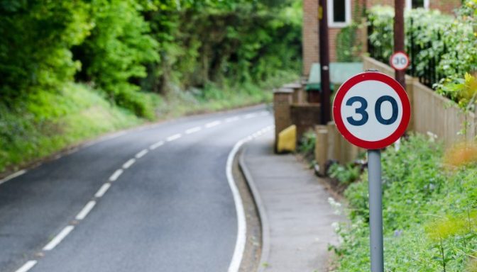 Speed limit sign on side road 640686250